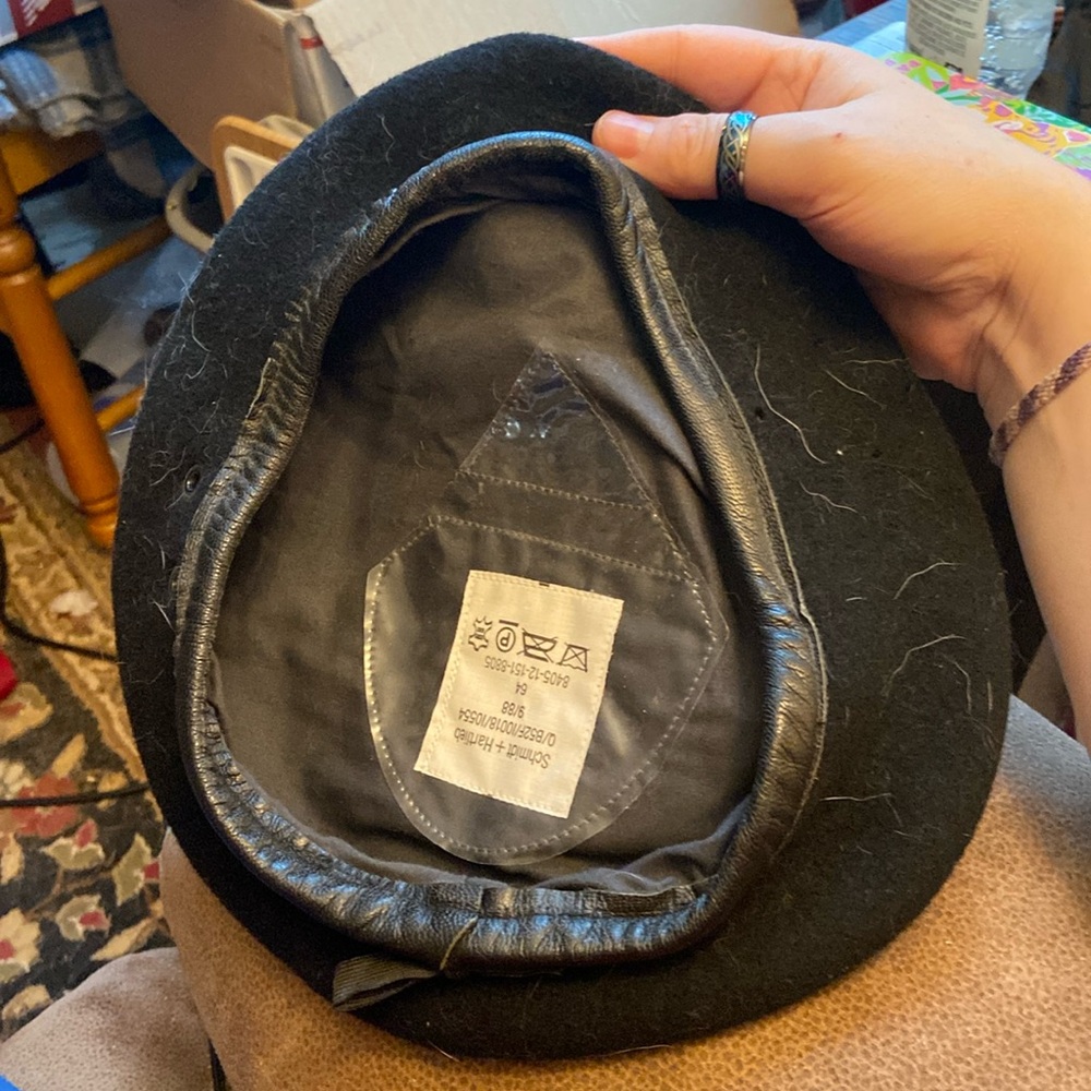 Black beret with leather trim